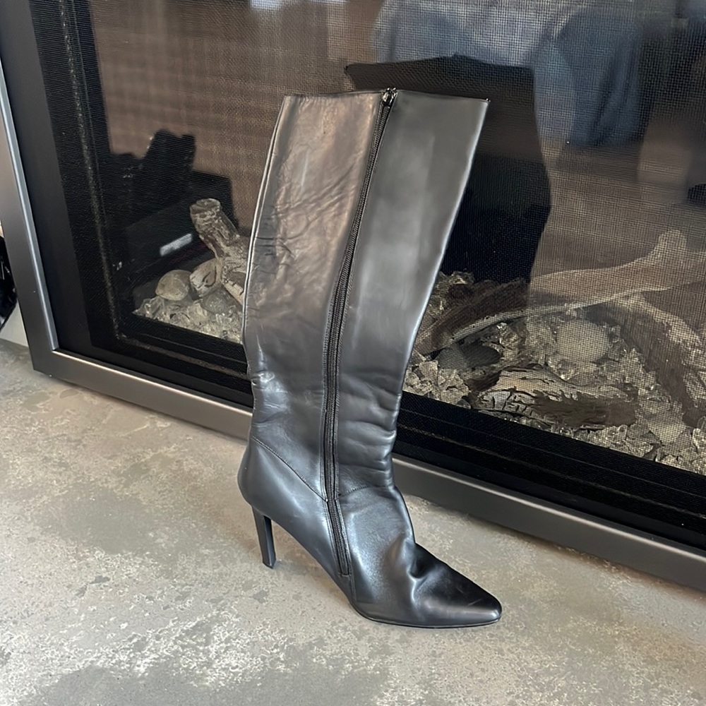 Black knee-high boots with heels